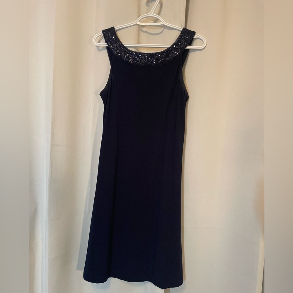 - above the knee
- Navy Blue
- sequin neckline & straps